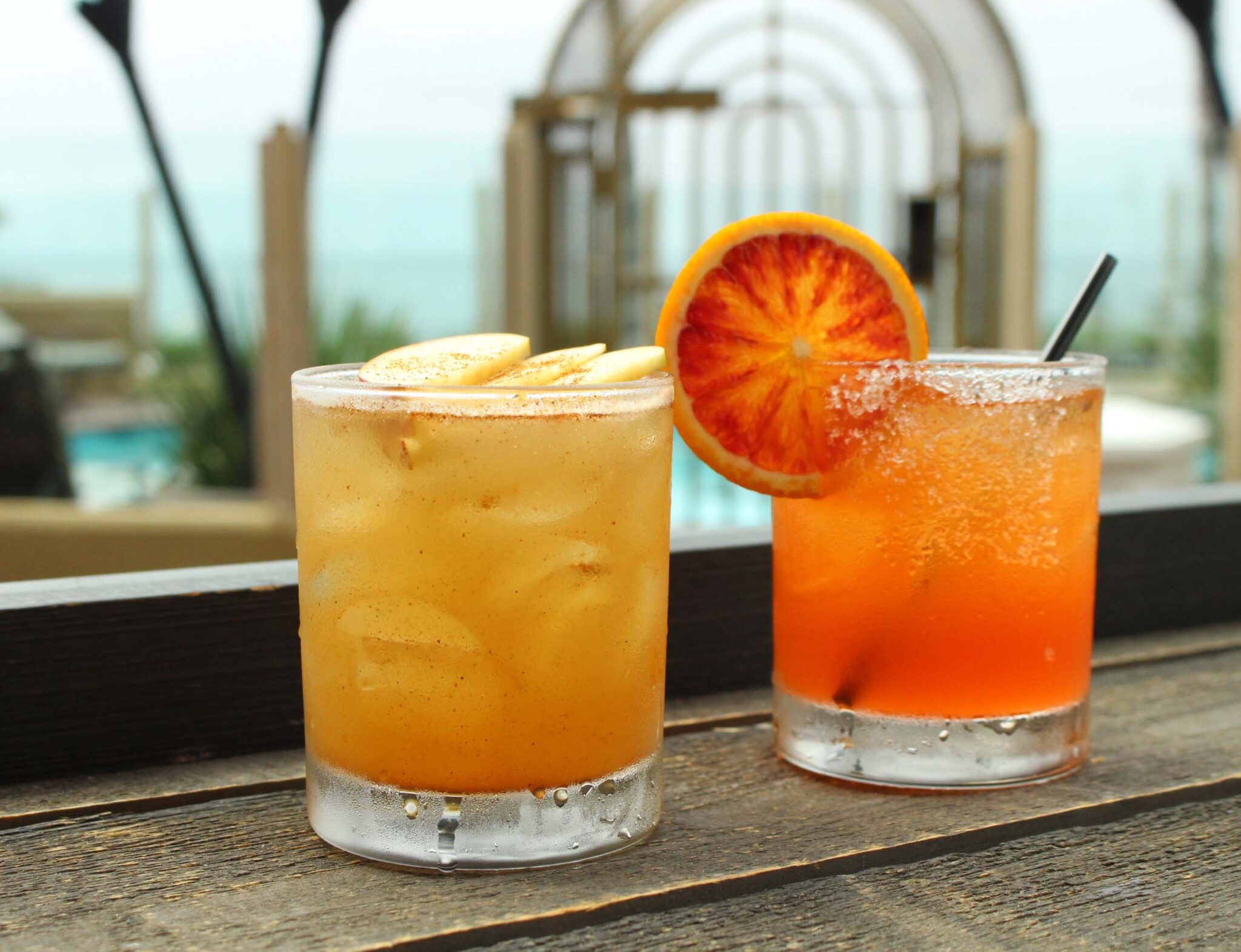 Two cocktails drinks with the pool view